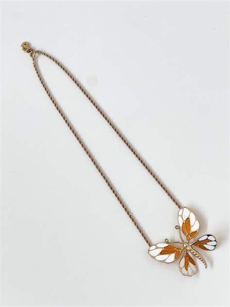 dior butterfly pearl necklace